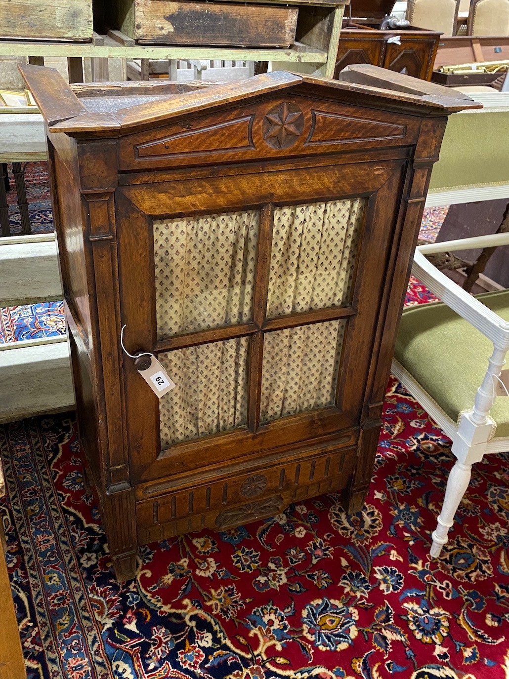 A 19th century French provincial miniature fruitwood armoire, width 69cm, depth 35cm, height 100cm